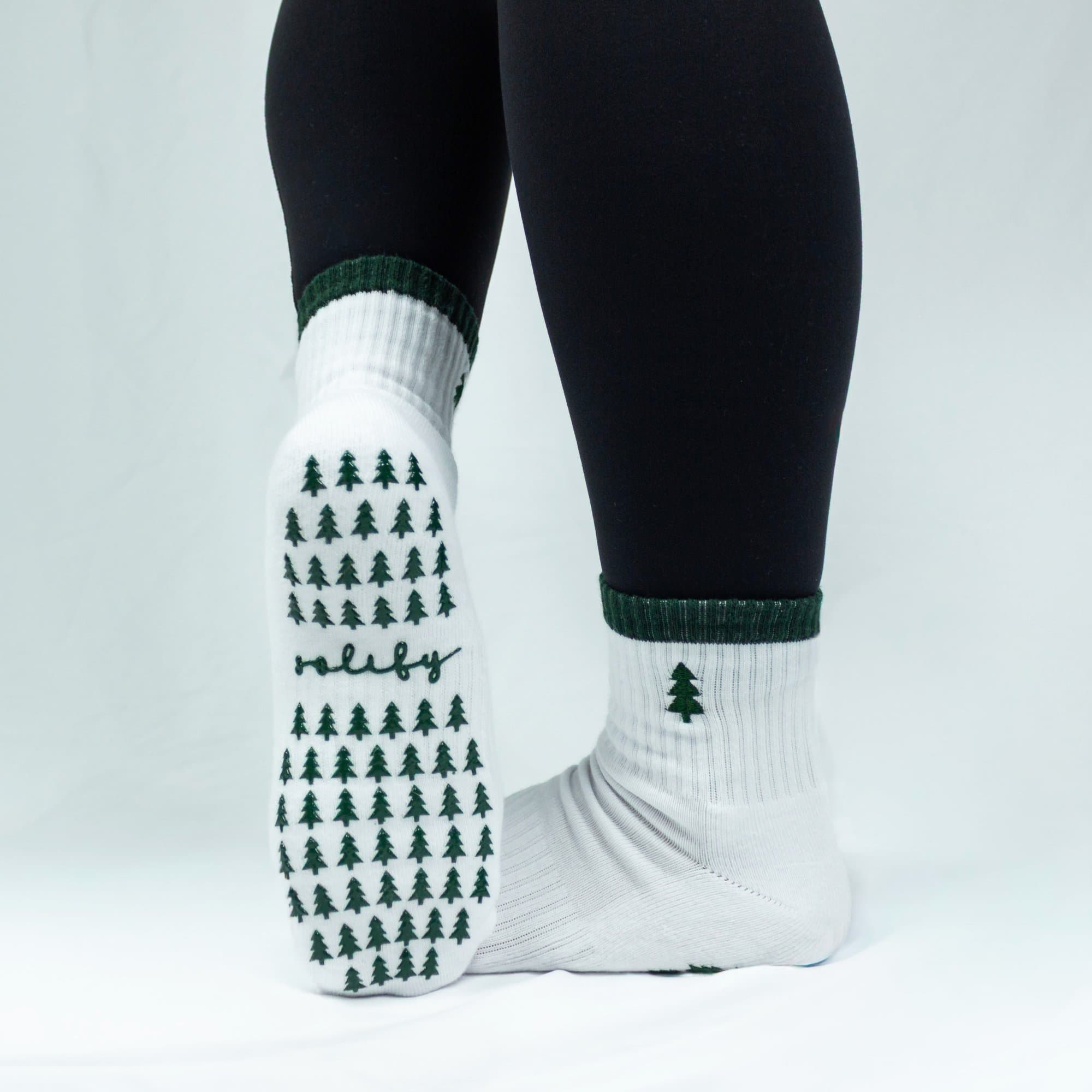 Evergreen holiday grip sock — green tree rubber grip pattern on the sole