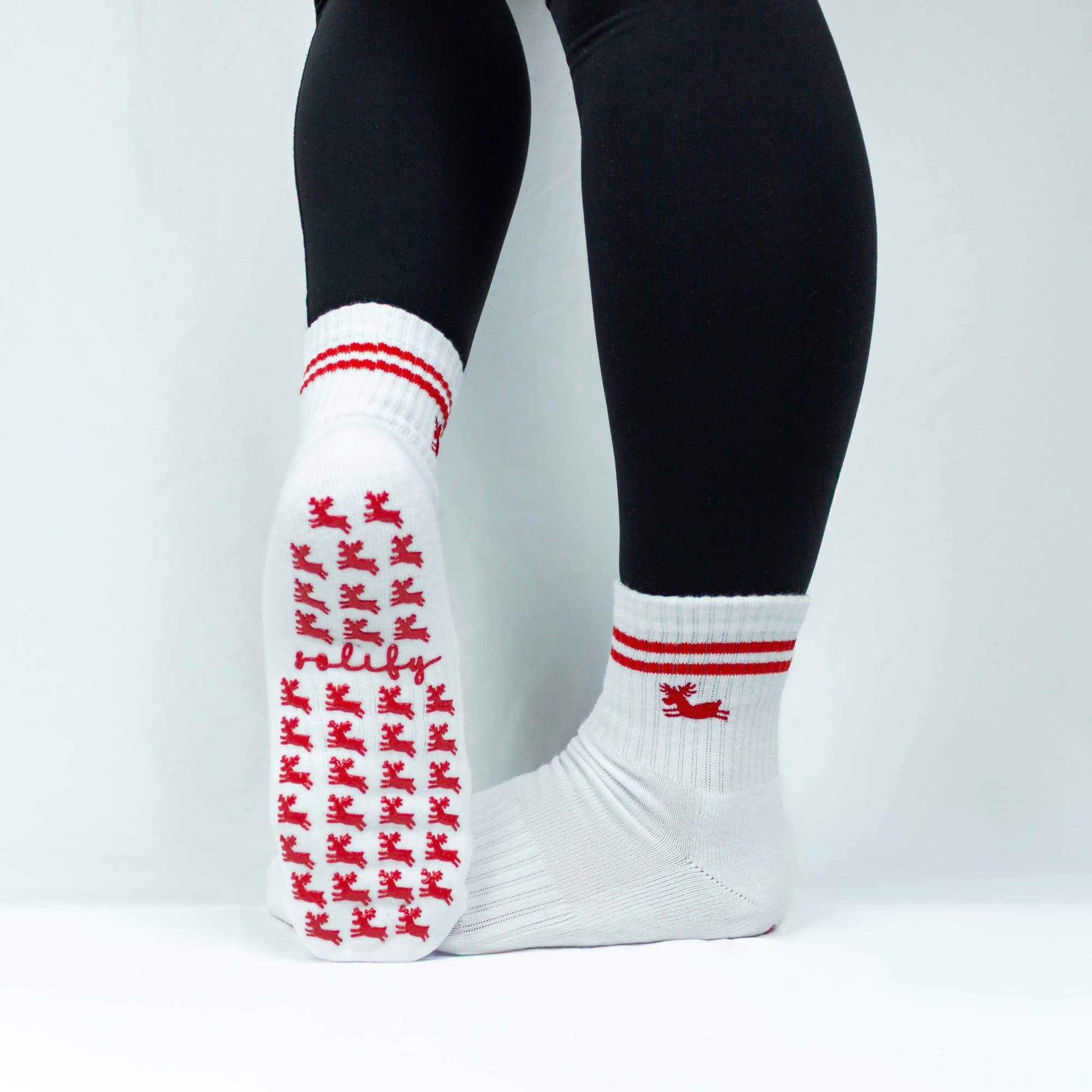 Reindeer holiday grip sock — reindeer rubber grip pattern on the sole